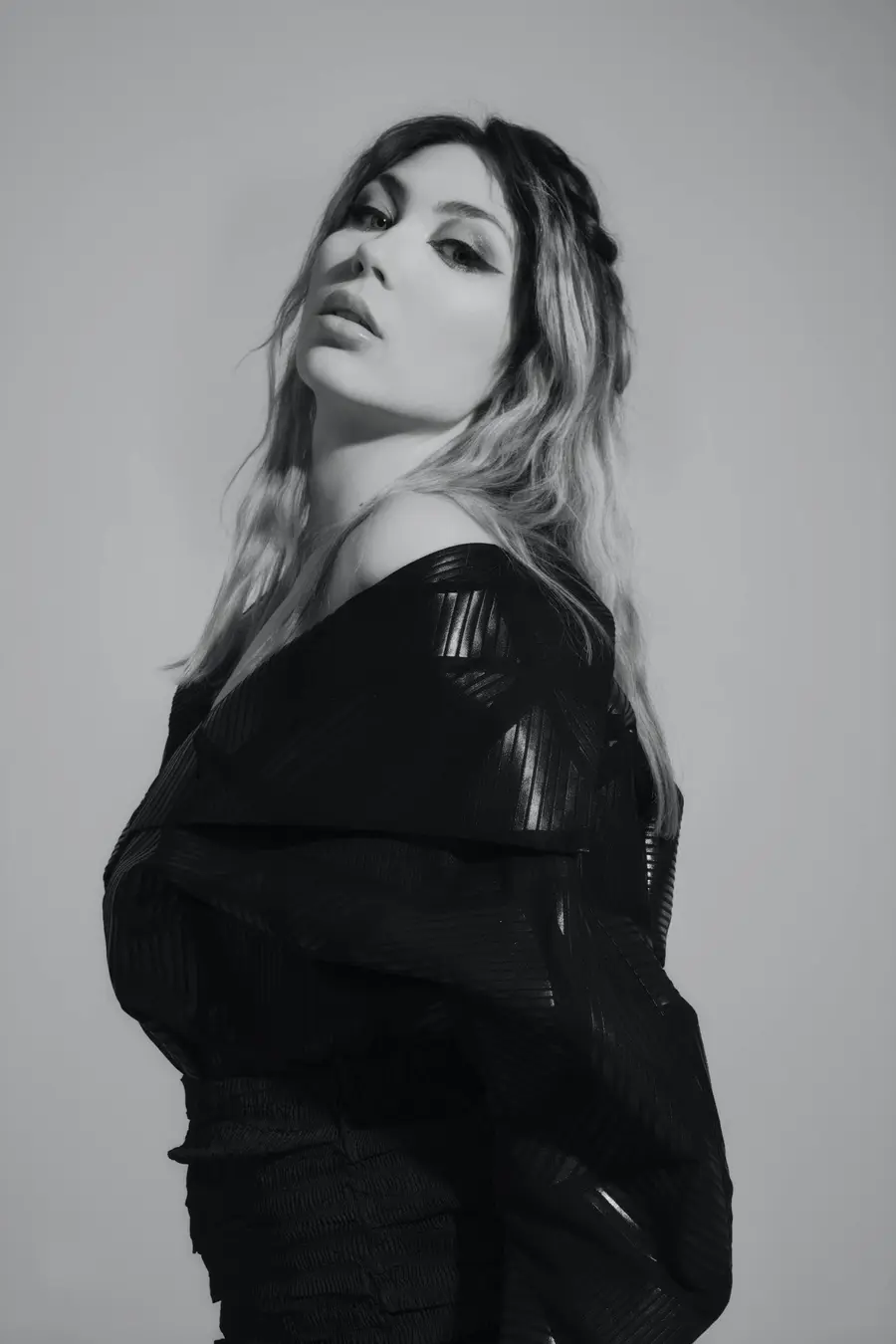 High-fashion black and white portrait of a woman