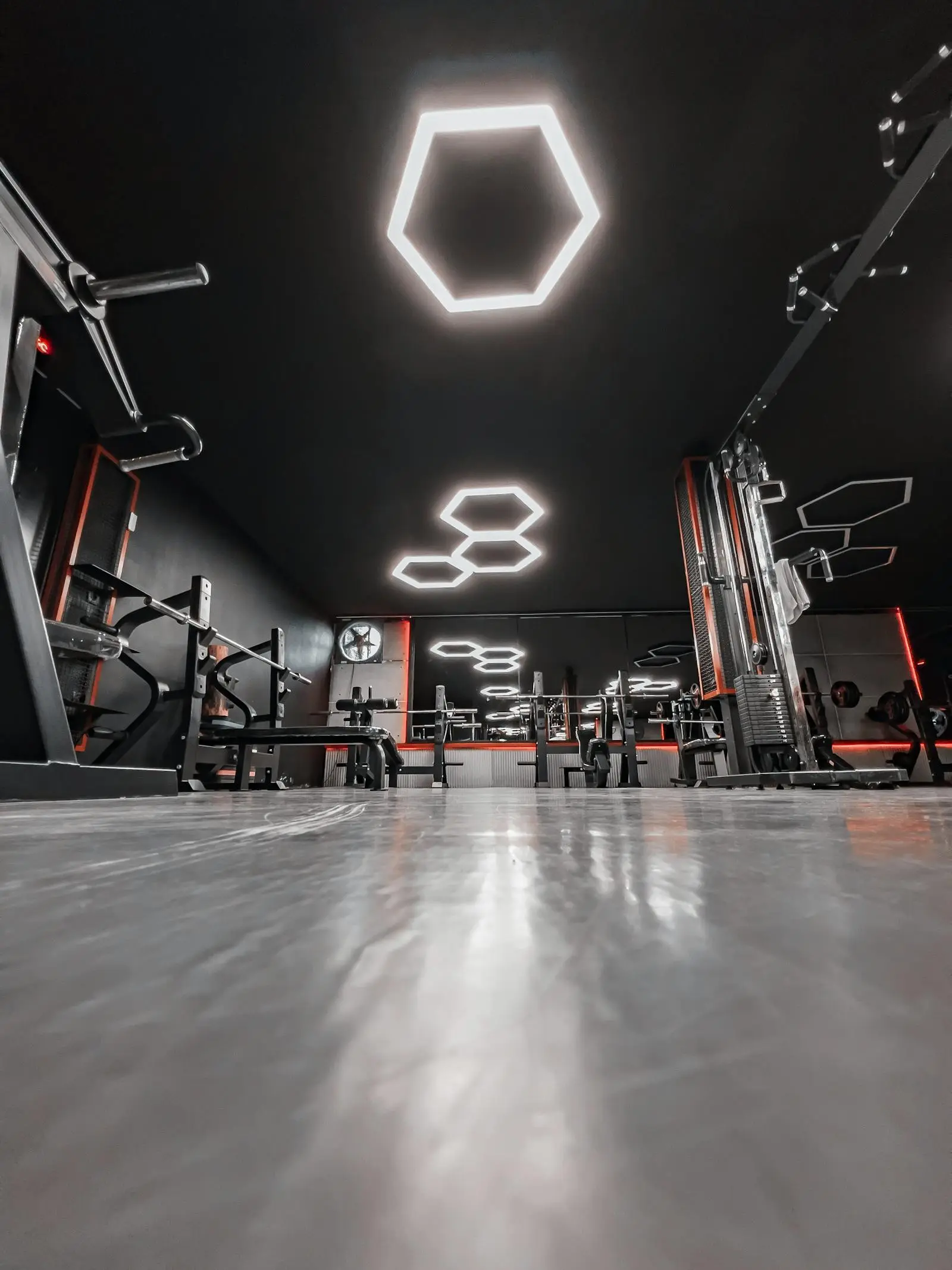 The dark, modern training floor at Summit Strength in Denver